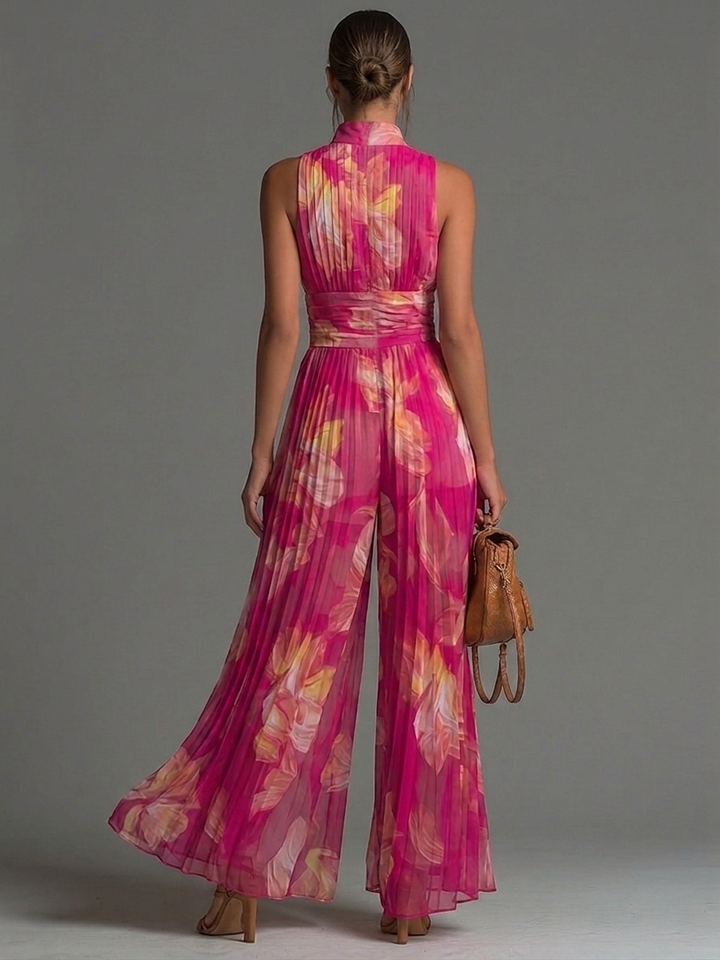 Nicole | Plissé jumpsuit met fuchsia bloemenprint